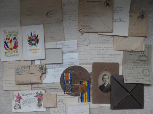 BRITISH WAR AND VICTORY MEDALS AND BRONZE MEMORIAL PLAQUE -TO OLIVER GEORGE LOCK-SOUTH WALES BORDERERS-COMES WITH A WONDERFUL ARCHIVE OF LETTERS,ETC