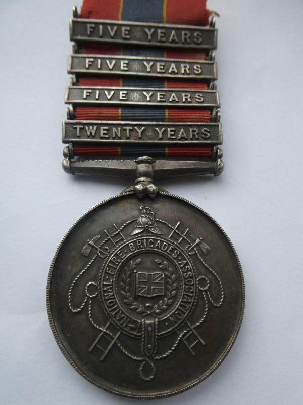 NATIONAL FIRE BRIGADES ASSOCIATION MEDAL WITH TWENTY YEARS CLASP AND THREE FIVE YEAR CLASPS-NAMED TO 3582 JOSEPH BROOKE
