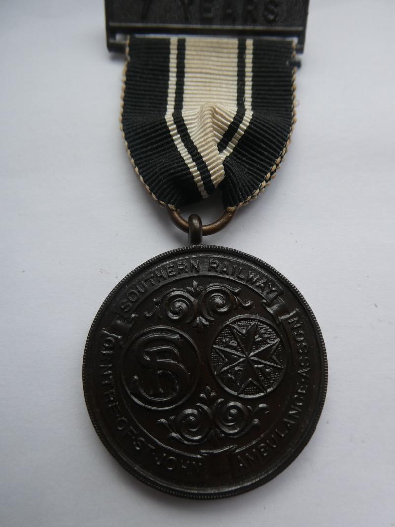 SOUTHERN RAILWAYS CENTRE OF ST.JOHN AMBULANCE ASSOCIATION BRONZE MEDAL WITH 7 YEARS CLASP-NAMED TO: MAURICE GOODWIN 1939