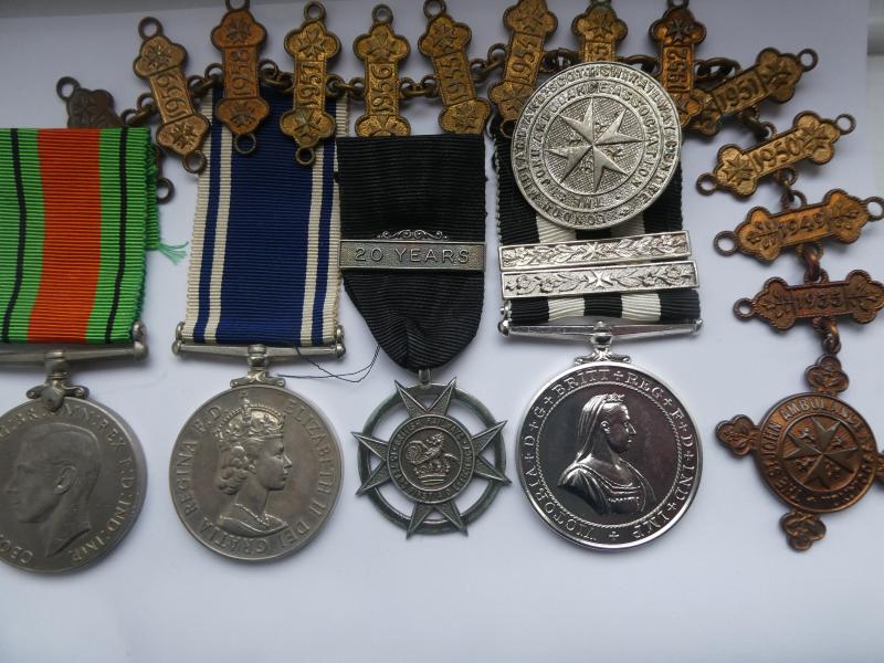 GROUP OF FOUR-AND BADGES- TO HORACE E HOLGATE RAILWAY POLICE-LONDON MIDLAND SCOTTISH RAILWAY-ORDER OF ST JOHN