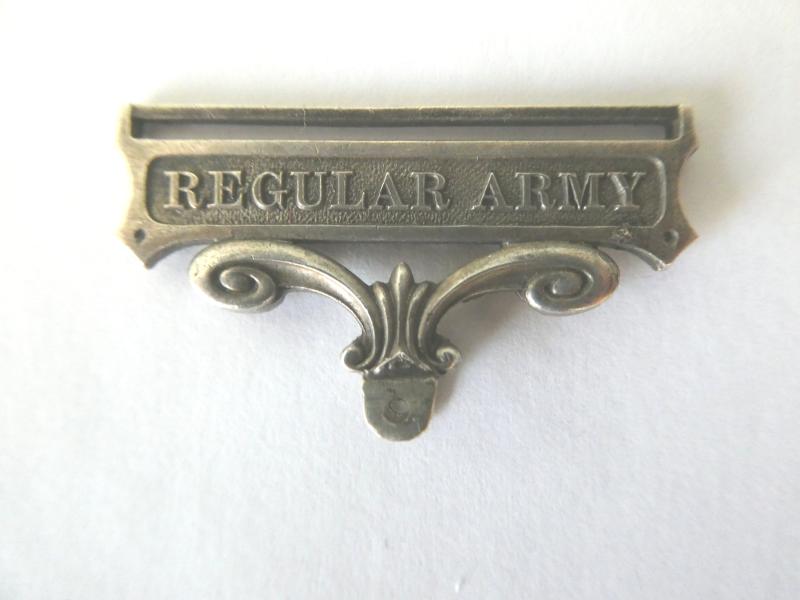 AN ORIGINAL REGULAR ARMY CLASP AND SUSPENSION FOR THE ARMY LONG SERVICE AND GOOD CONDUCT MEDAL