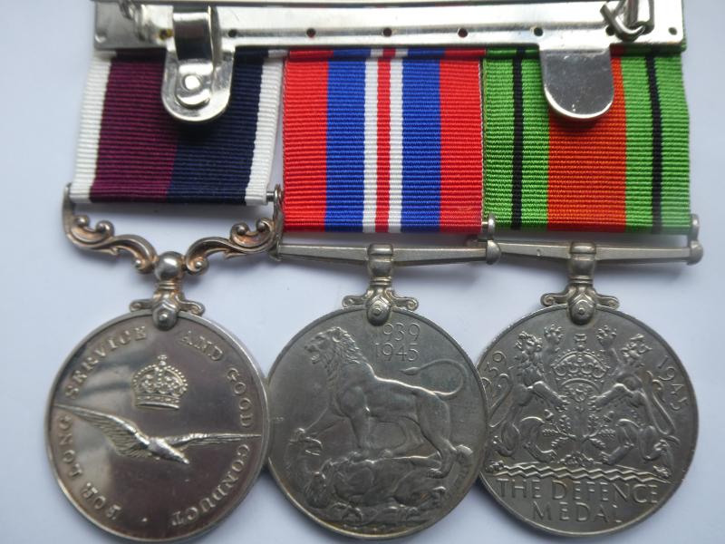 LONG SERVICE GROUP PF THREE TO ACTING FLIGHT LIEUT EDWARDS R.A.F. (LATER SQUADRON LEADER)