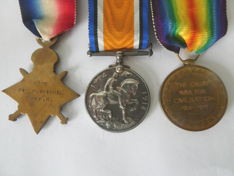 1914/15 STAR TRIO-TO WRIGHT-SUFFOLK REGT-DISCHARGED WITH A FRACTURED SKULL